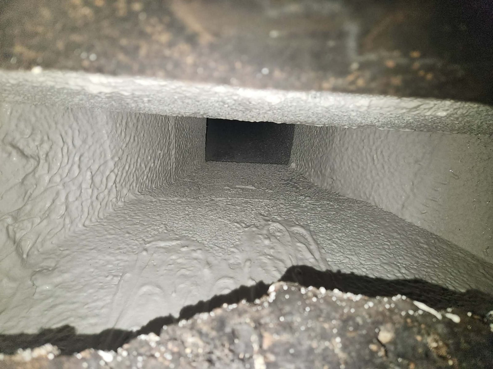 Smoke chamber parged with high-temperature refractory mortar up-close view completed in Toledo